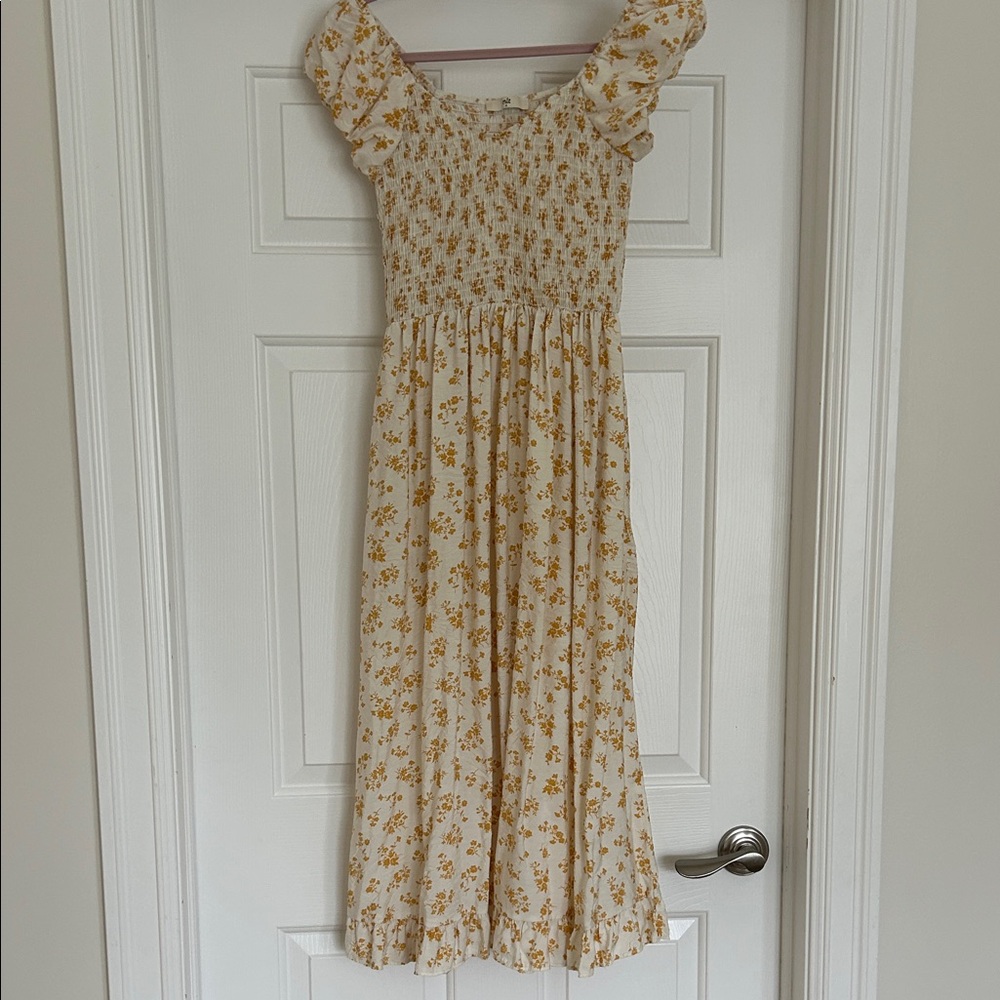 Shop Dahl cream & yellow smocked summer dress